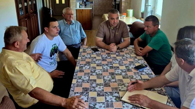 Maslar sa meštanima ariljskih sela